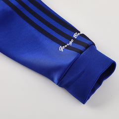 Manchester United X George Best Blue Track Jacket 2024/25 For Adults-The Jerseys Shop
